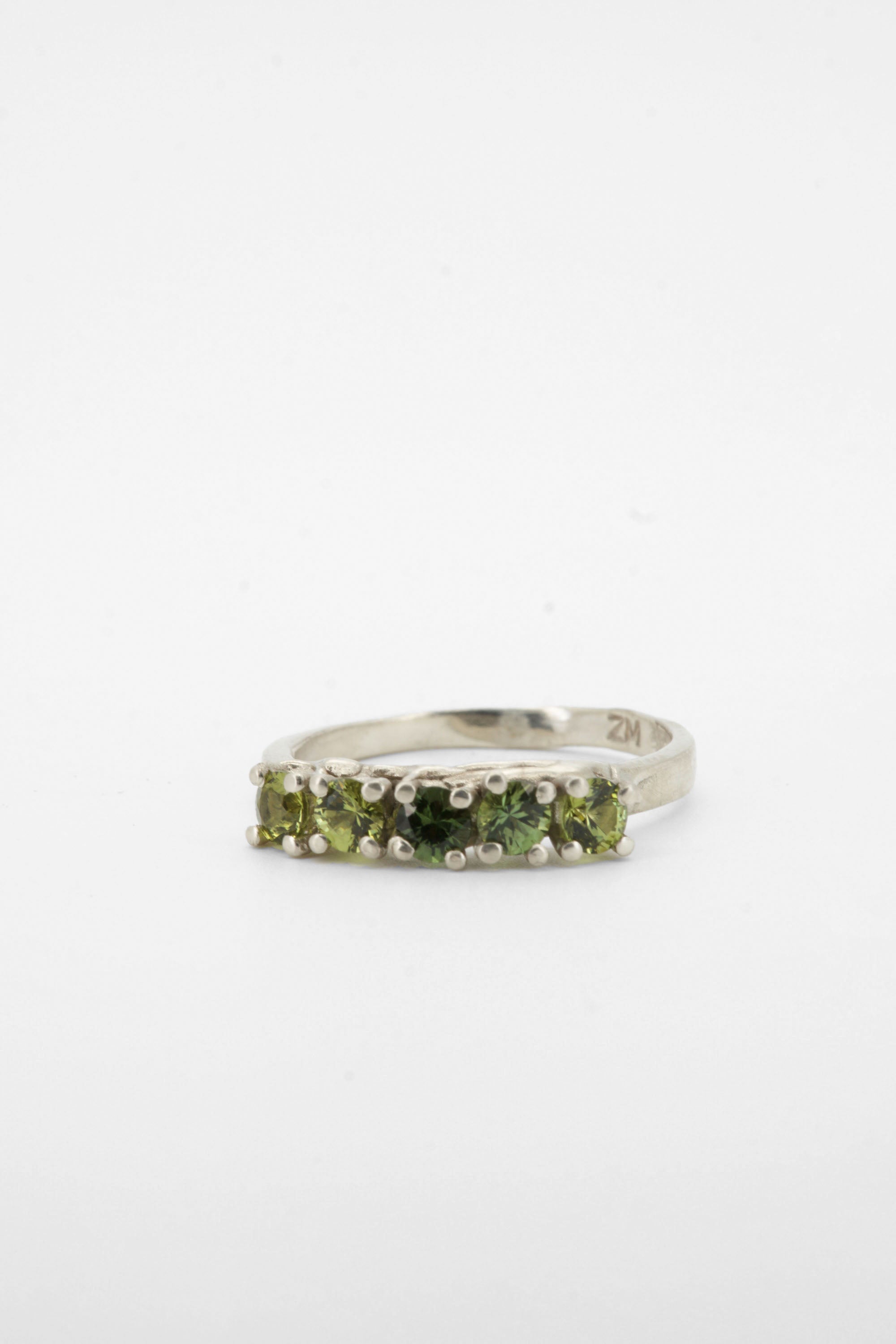 Green sapphires + 9ct white gold