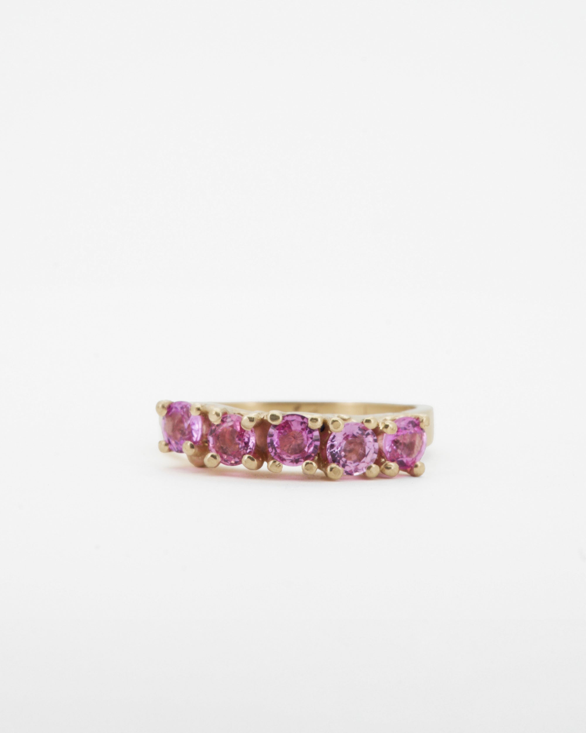 pink sapphires + 9ct yellow gold