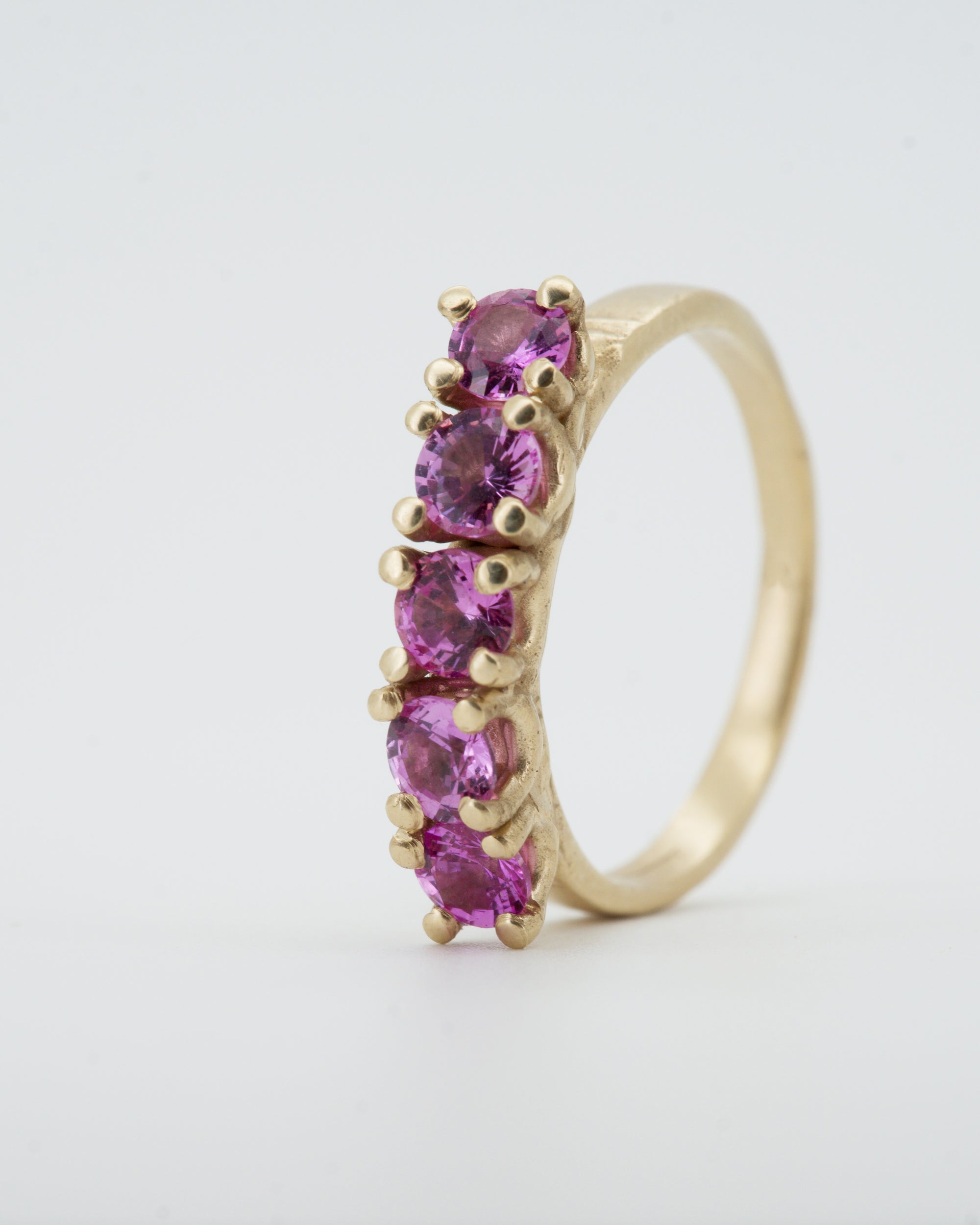 pink sapphires + 9ct yellow gold