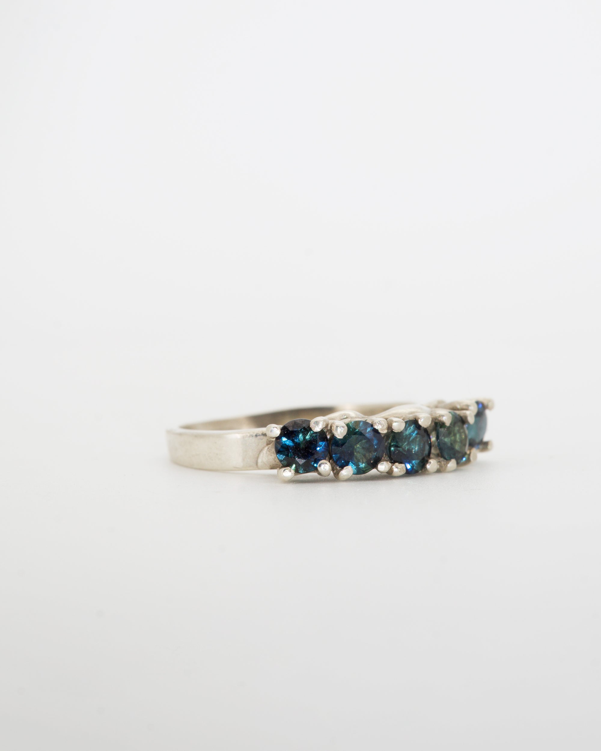 teal sapphires + 9ct white gold