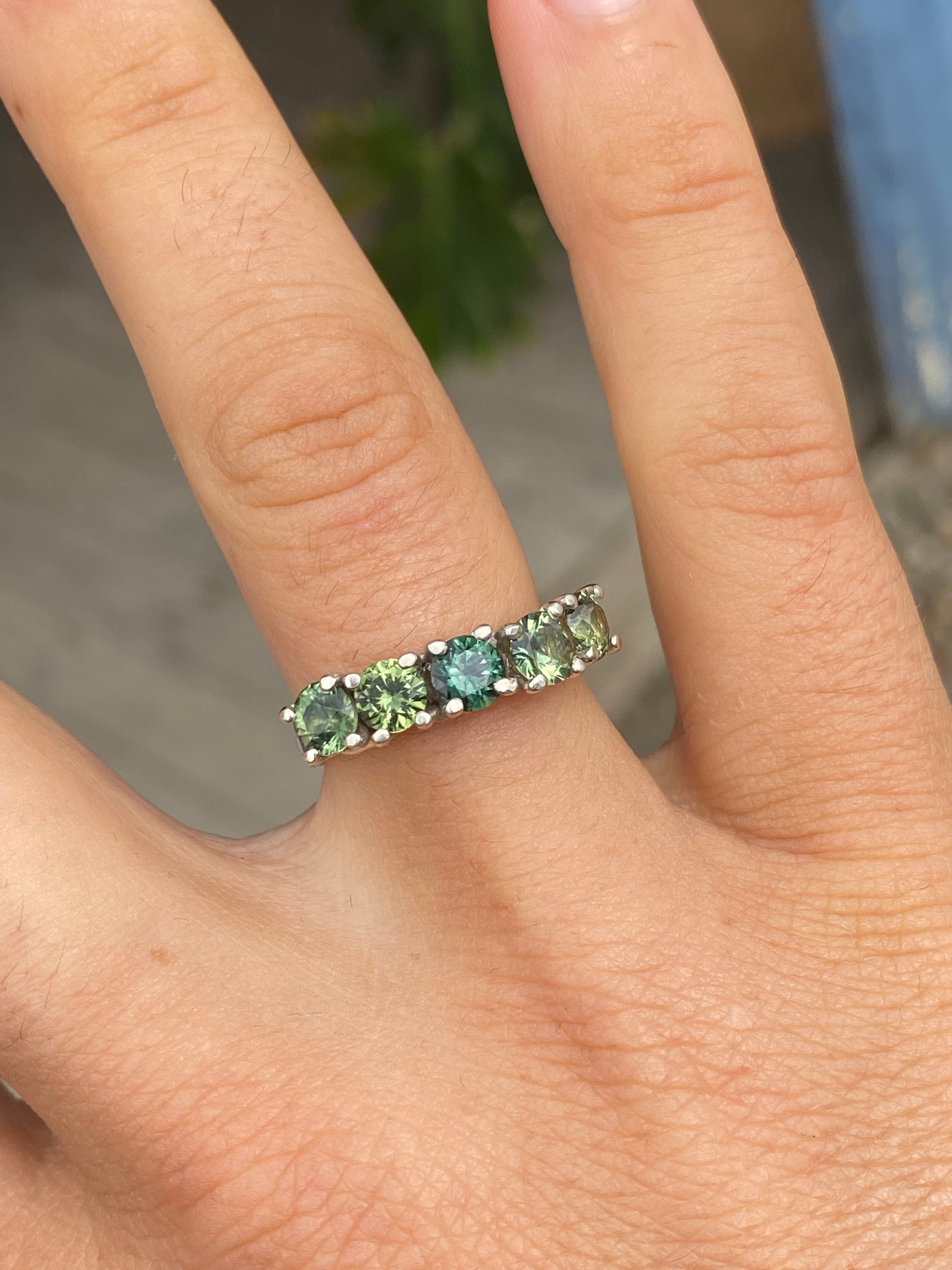 green sapphires + 9ct white gold